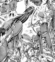 Un grupo de guardias de  atacan a un  armados con arcos y flechas.