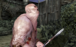 Debilitas holding a giant pair of scissors.