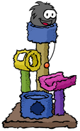 A Black Puffle playing with the Scratch Tower.