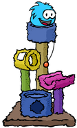 A Blue Puffle playing with the Scratch Tower.