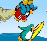 On Jet Pack Surfer when he is dropping a penguin in Catchin' Waves.