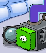 A Green Puffle exiting a Puffle Washer