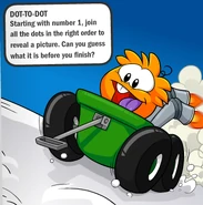The Orange Puffle driving on its "Monster Truck Wagon"