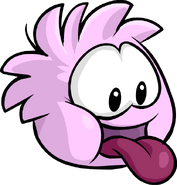 A Pink Puffle sticking its tongue out.