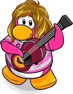As seen in issue 247 of the Club Penguin Times, along with The Sunray and Pop Music Shirt