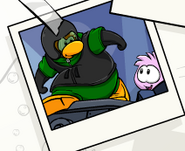 A stampbook picture of a Pink Puffle getting help in Puffle Rescue.