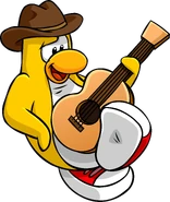 Franky sitting with his guitar