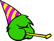 A green puffle wearing the party hat in issue #21 of the Club Penguin Times