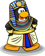 As seen in the October 2010 Penguin Style catalog, along with the Pharaoh Costume and Gold Bracelets