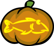 Pumpkin carving of Fluffy, as seen floating past the windows of the Underground Pool during Halloween Parties