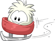 A White Puffle riding in an ice skate (newer artwork).