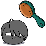 Black Puffle being brushed.