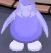 glitche número 2 pingüino con una gorra completamente morado con un poquito de blanco