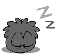 Black Puffle sleeping.