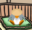 Sensei sitting on his green pillow in the Dojo