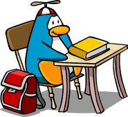 As seen in issue 51 of The Penguin Times, along with the Red Propeller Cap, Red Backpack, and Log Table