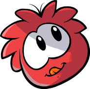 A red puffle sticking its tongue out