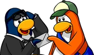 As seen in issue 198 of the Club Penguin Times, along with the Black Sunglasses, Black Bowtie, Black Suit, and Green Ball Cap