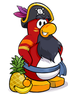 Rockhopper junto a algunas frutas en la fiesta tropical