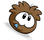 The Brown Puffle sticking its tongue out