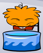 An Orange Puffle taking a bath