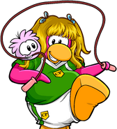 As seen on the pink version of the "Puffles!" login screen, along with the Green Soccer Jersey