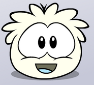 When you tickle a white puffle, it giggles