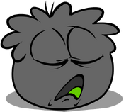 A sleepy Black Puffle.