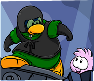 A stampbook picture of a Pink Puffle getting help in Puffle Rescue