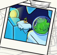 A Stamp Book picture of a Green Puffle playing Pufflescape