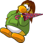 As seen in issue 264 of the Club Penguin Times, along with the Green Hoodie and Polka Dot Umbrella