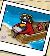 Rockhopper atorado con su lancha atorada en la arena