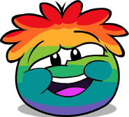 A happy and smiling Rainbow Puffle.