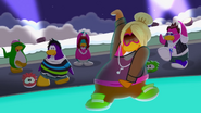 Aunt Arctic in the background dancing while a female penguin dances