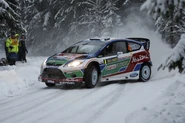 Jari-Matti Latvala driving his Ford Fiesta RS WRC in 2011 Sweden Rally.