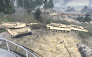 Varios tanques Abrams en la misión "Jugador de equipo".