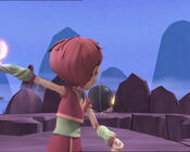 Aelita prepares to fire an Energy Field at a Megatank stuck between the rocks.