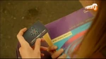 Laura finds the Quantum Research Center card given by Graven.