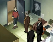 Људи у црном, господин Делмас и Џим.