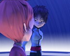 William looking at Aelita, who doesn't have any weapon.