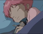 Aelita holding Mr. Pück in her sleep.