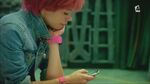 Aelita preparing to call someone.