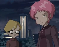 Jeremie and Aelita on the bridge, some buildings seen behind them.