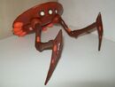 A Krab Toy Half Done in a Bulid a Krab.