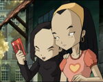 Yumi gives Sissi her concert tickets.