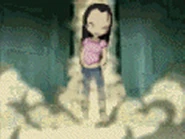 Sissi-XANA se materializando e saindo dum digitalizador.