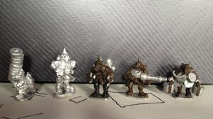 A Grot carrying Ammo, an Ork leader, a Jump pack ork and two special weapon Orks.