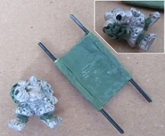 Wounded dwarf and stretcher