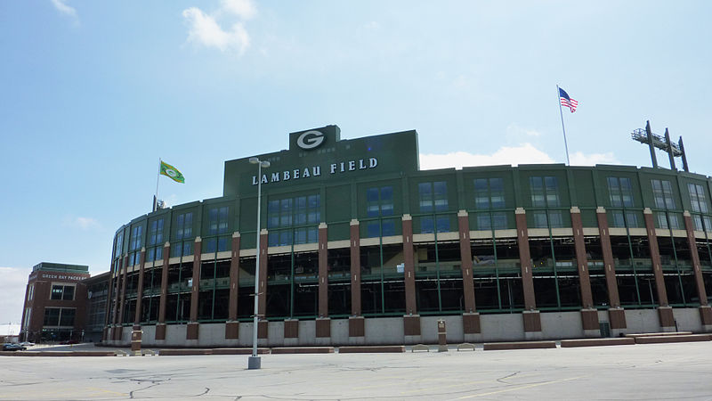 Fans wait out rain to see historic match at Lambeau