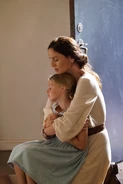 Katie holds her daughter tight, in the episode "Blind Spot"